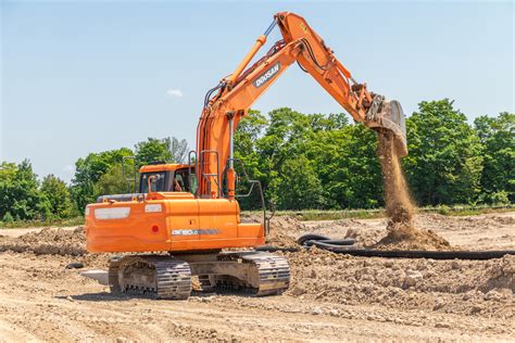 Mini Excavator Building A Dirt Access Road 